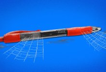 red pen with cobwebs on it